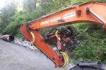 Baggerprozessor DOOSAN DX210W mit WOODY60