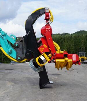 Close-up view of a powerful forestry machine featuring vibrant colors and metallic parts